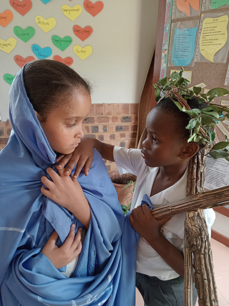 The Social Teaching of the Catholic Church promotes and fosters intercultural integration through education. Children at Maryvale College during the 2024 Passion Prayer. Credit: Evelyn Patrick.