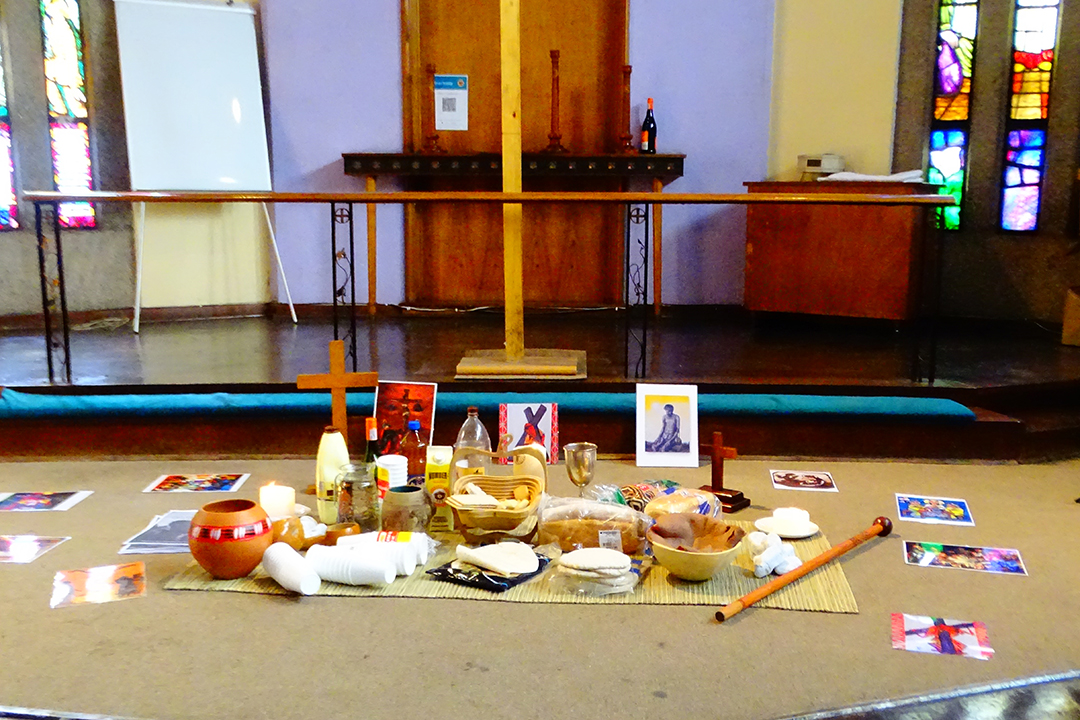 Various cultural symbols displayed during an ecumenical celebration at the Urban Ministry seminar in August 2024 at Tshwane Leadership Foundation, Pretoria.