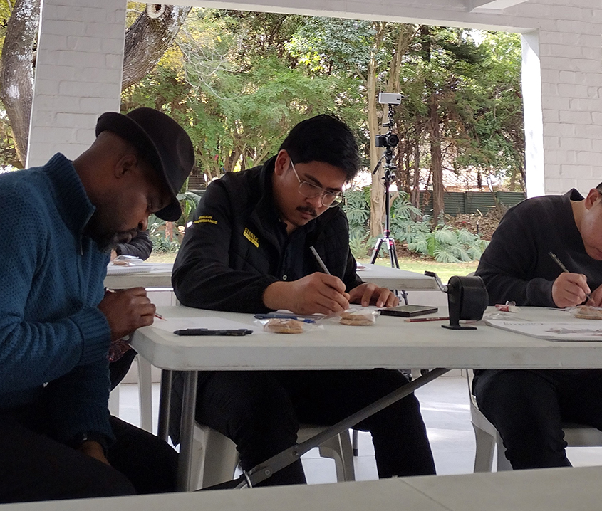 Participants fully engaged in their artwork and meditation during the Mental Wellness Doodle Art workshop at the Philippine Embassy in Pretoria.