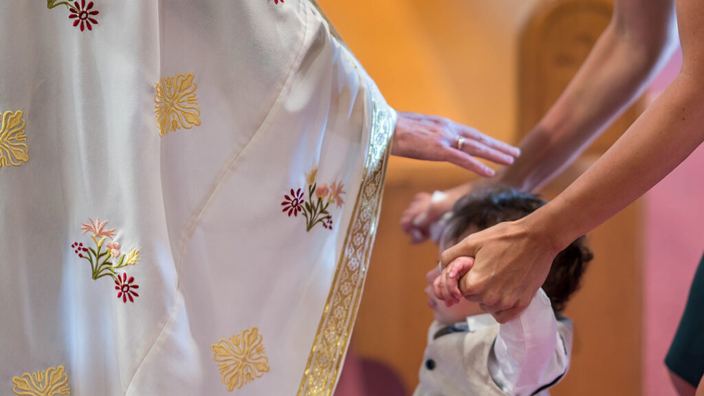 The priest gives the blessing to go and spread the Good News to all. 