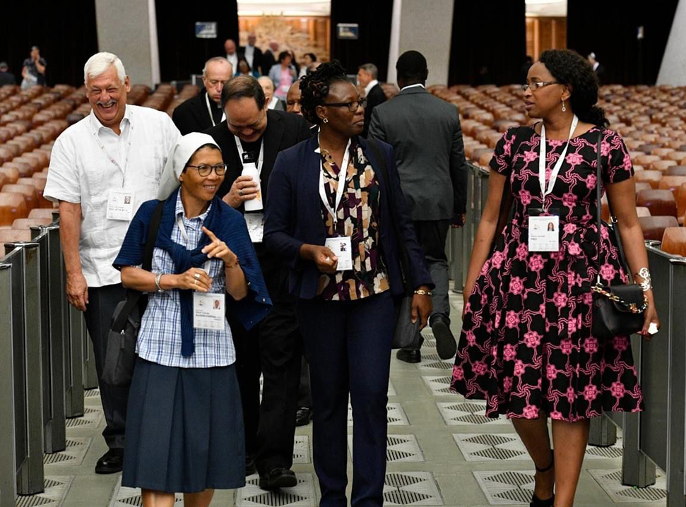 Sheila Pires and other Synod delegates entering the Plenary Assembly Hall during the Synod on Synodality.