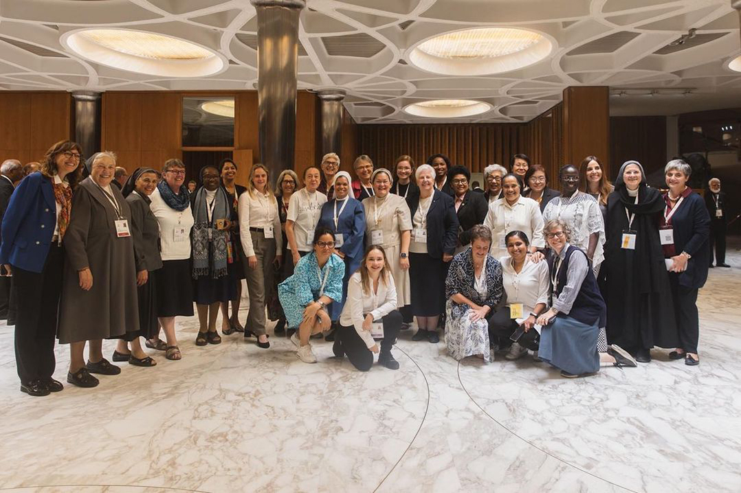 A group of female delegates attending the Synod on Synodality.