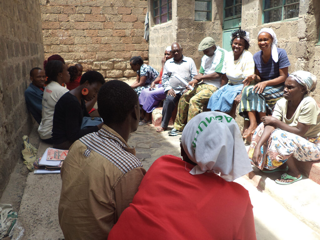 Members of the University of Mtaani’s outreach programme participating in a sanitation dialogue at Tangaza University College in Gitathuru, Huruma, Nairobi.